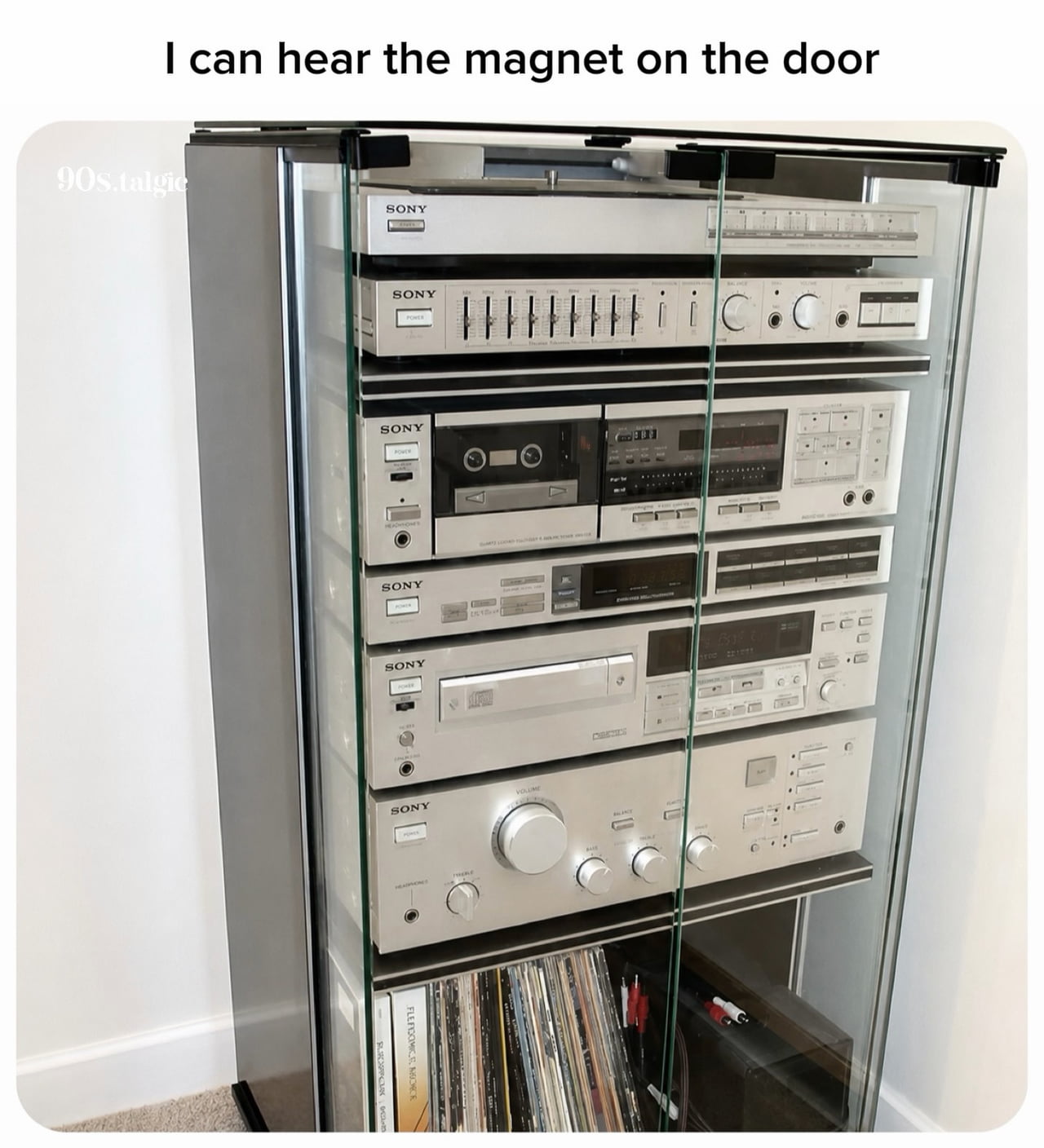 A Classic 90s Sony Stereo System Housed in a Glass Cabinet