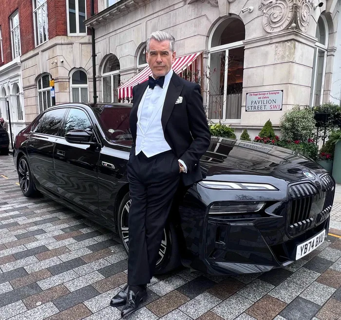 Pierce Brosnan Poses With a Modern BMW