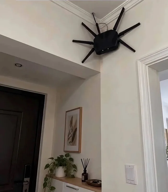 Wall-Mounted Wi-Fi Router Resembles a Large Spider - Funny on Aviaclip