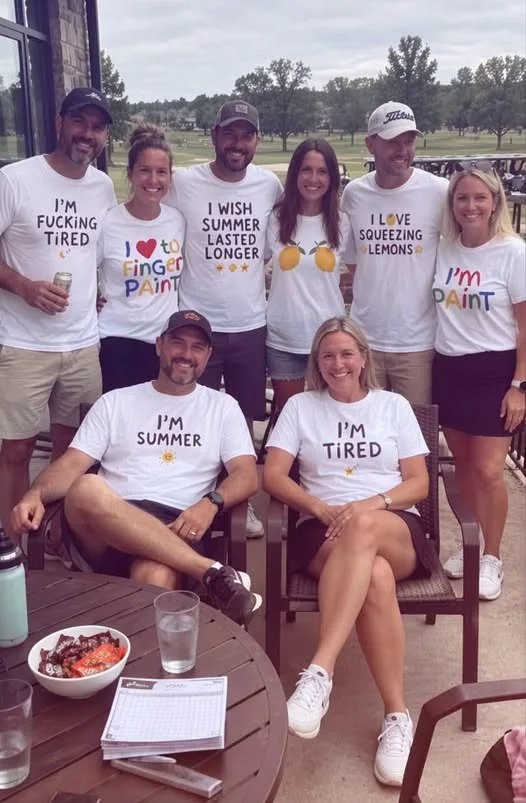 Group of Friends Wears Matching T-Shirts with Suggestive Phrases