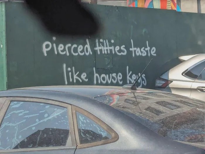 Unusual Graffiti Found on a Construction Barrier - Funny on Aviaclip