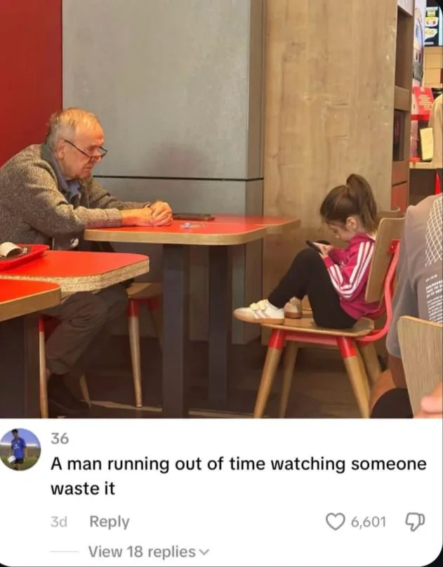 Generational Contrast Captured at a Dining Table