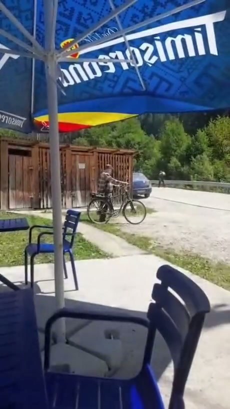 Cyclist Takes an Unexpected Tumble in Rural Setting