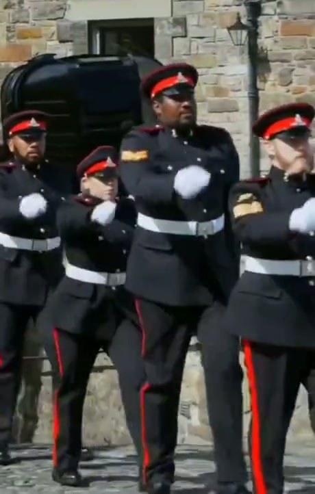 Military Personnel Marching in Formation