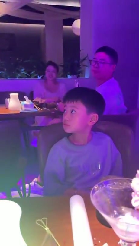 A Young Boy's Surprising Encounter During a Restaurant Performance