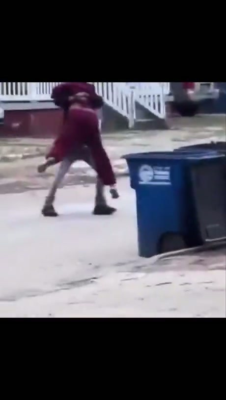 Person Gets Dumped Into a Trash Bin in Residential Neighborhood