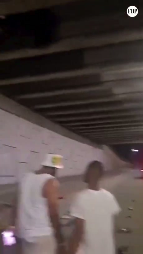 Car Found Wedged in Unusual Position Under Overpass