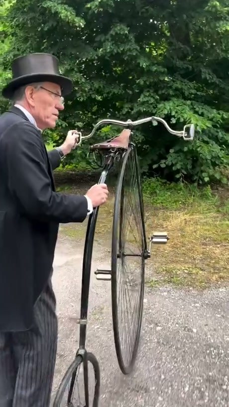 A Gentleman Takes His Penny-Farthing for a Spin