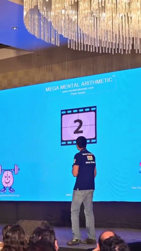 Human Calculator Performs Rapid Mental Arithmetic on Stage