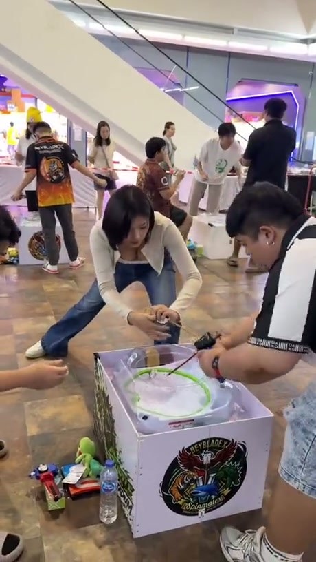 Casual Beyblade Match at a Public Event