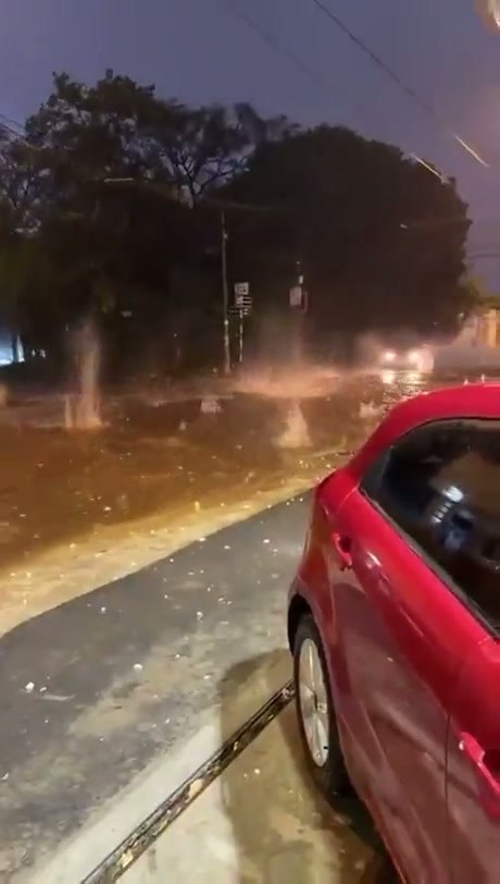 Intense Hailstorm Creates Dramatic Impact on City Streets