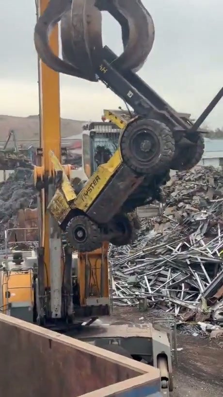 Industrial Scrap Metal Compactor Crushes Old Forklift