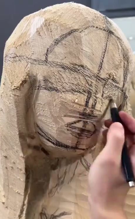 Precision Wood Carving of a Blindfolded Figure
