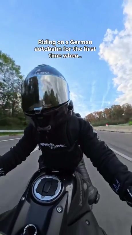 Motorcyclist Surprised by Scooter on the German Autobahn