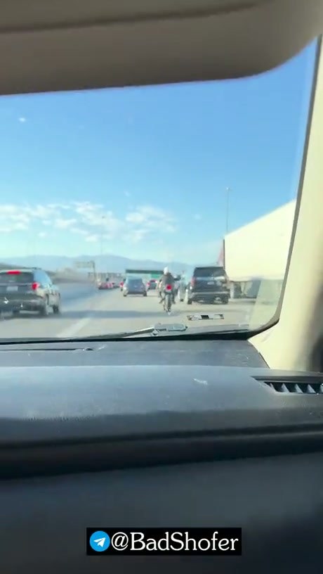 Motorcyclist Kicks Car Mirror in Highway Road Rage Incident