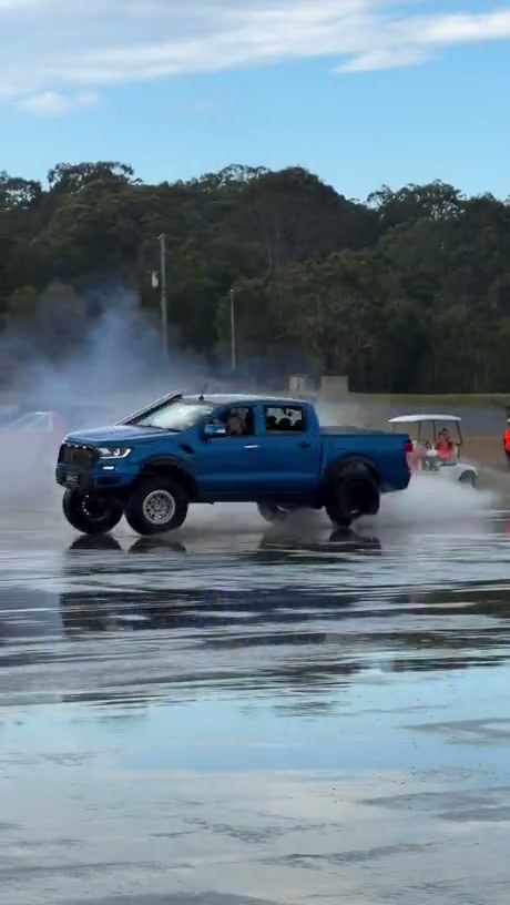 Blue Ford Pickup Truck Continues Driving After Losing Rear Tire
