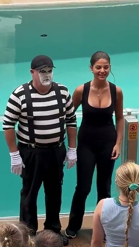 A Mime's Playful Interaction with an Audience Member